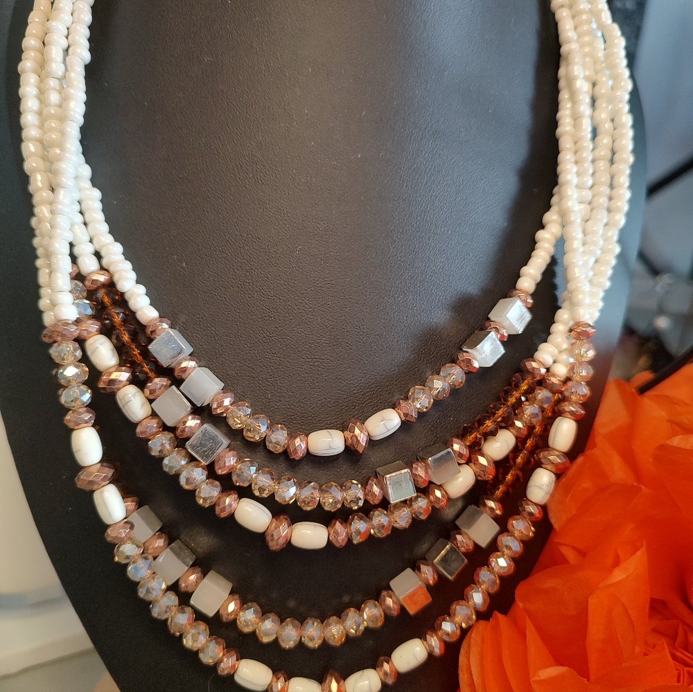18 white, amber and gold 5 strand